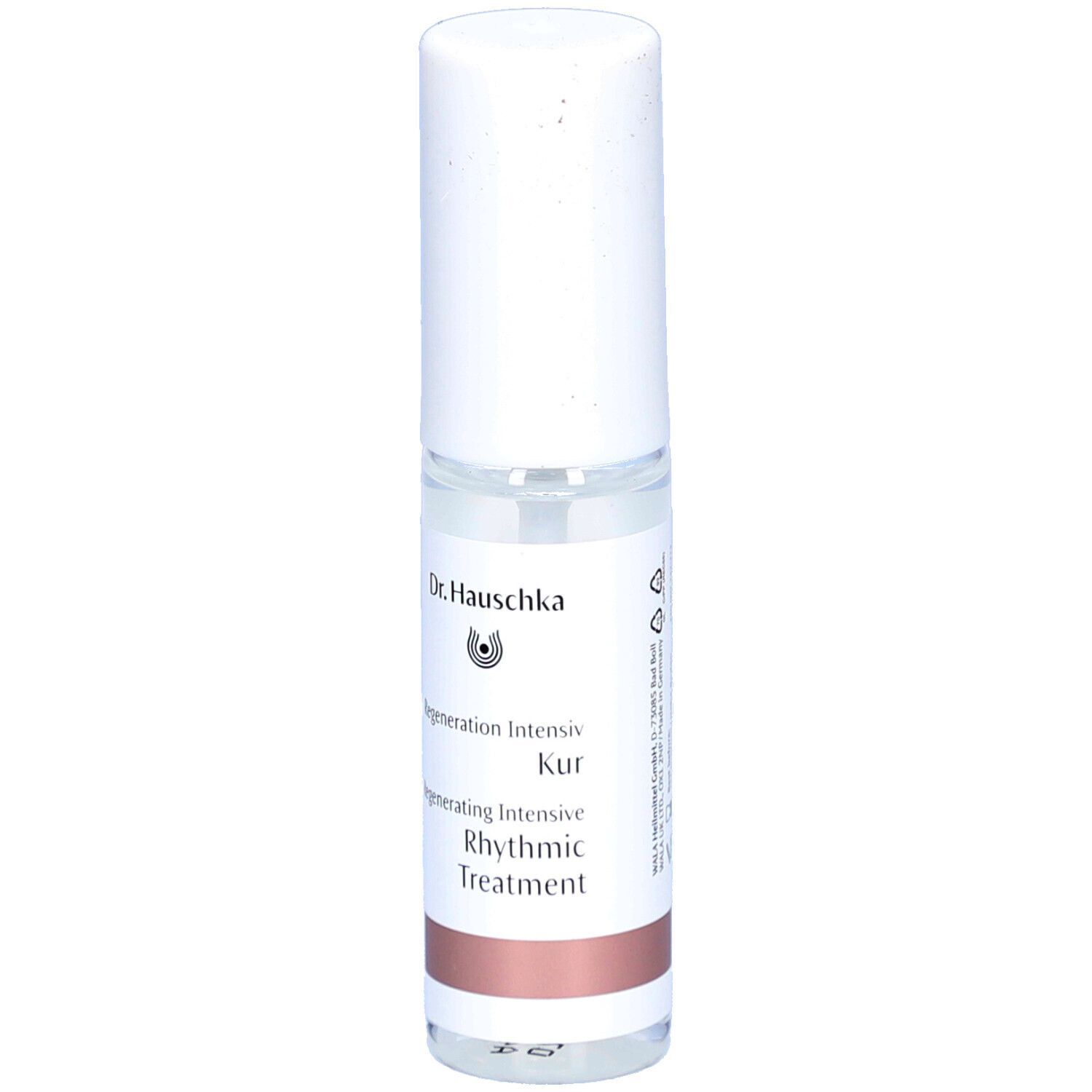Flacon spray transparent avec bouchon blanc. Inscription: Dr. Hauschka, Regenerating Intensive Kur.