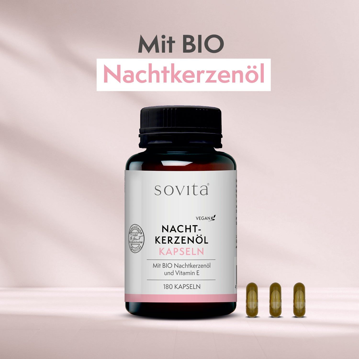 Flacon noir avec gélules brunes. Inscription : sovita, Capsules d'huile d'onagre, 180 gélules. 3 gélules à côté. Texte : Avec de l'huile d'onagre BIO.