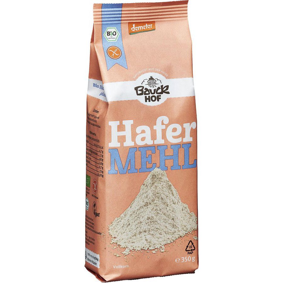 Emballage beige avec "Bauckhof Hafermehl Vollkorn glutenfrei". Logo bio, Demeter et tas de farine visibles.