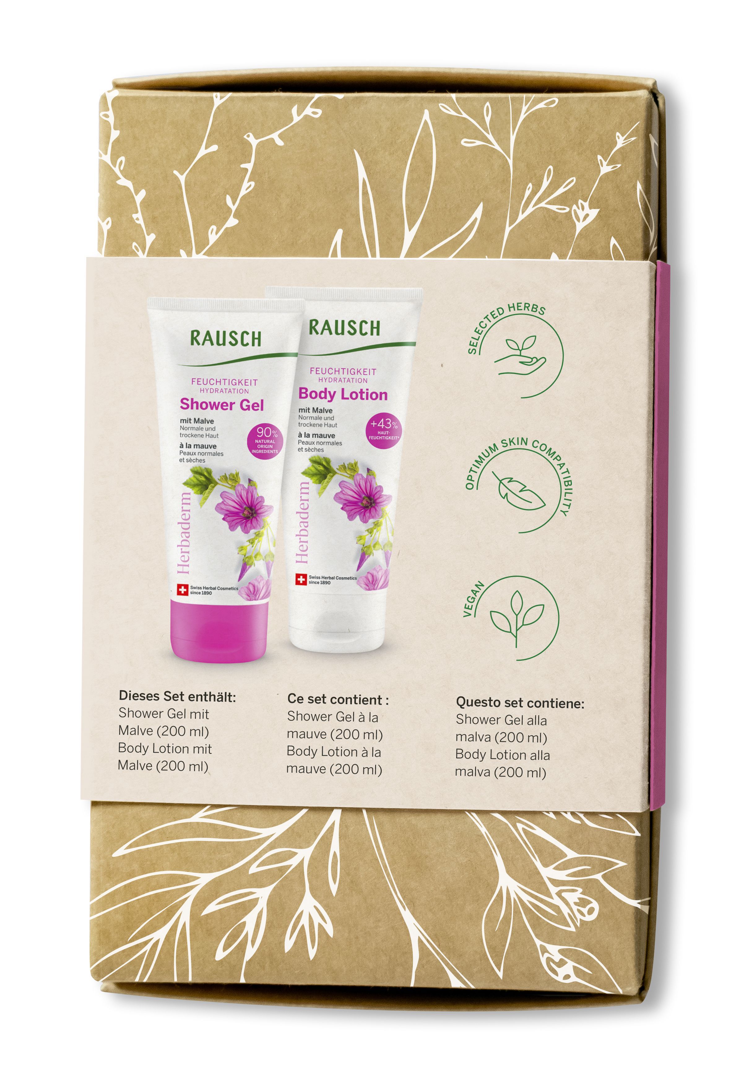 Coffret cadeau avec deux tubes et texte. Contient gel douche et lotion pour le corps. Emballage à motifs floraux.