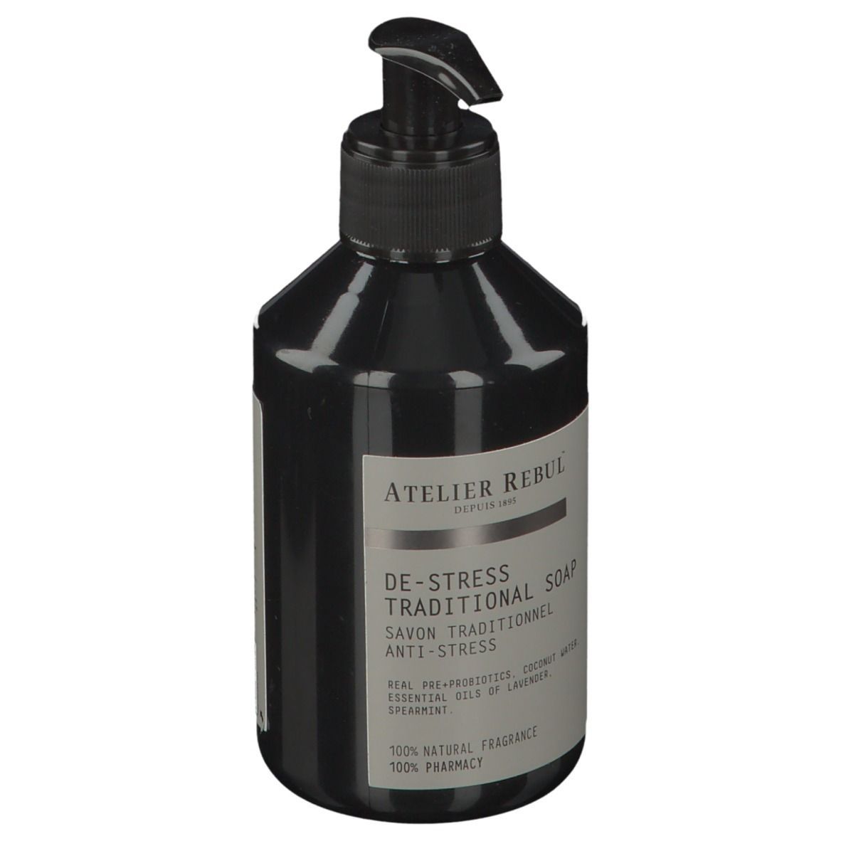 Flacon noir avec pompe. Inscription : ATELIER REBUL, DE-STRESS TRADITIONAL SOAP. Contient des huiles essentielles.