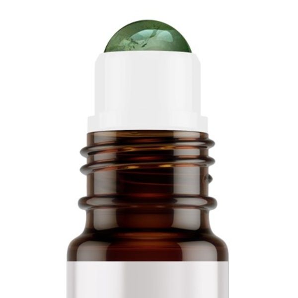 Flacon en verre brun avec bouchon blanc et applicateur roll-on vert. Gros plan, isolé sur fond blanc.